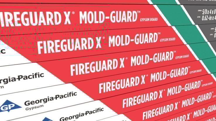 ToughRock® Fireguard X® Mold-Guard™ Gypsum Board close up on side tape which is vertical lines in the colors green, red, white and gray